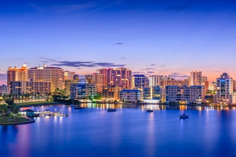 Downtown Sarasota skyline over the bay at dusk